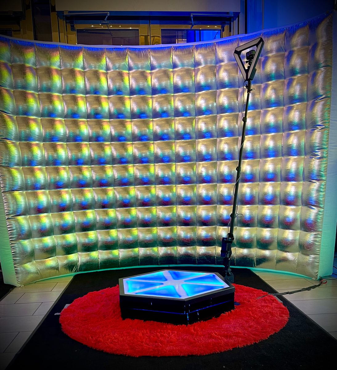 360° video booth with an illuminated backdrop